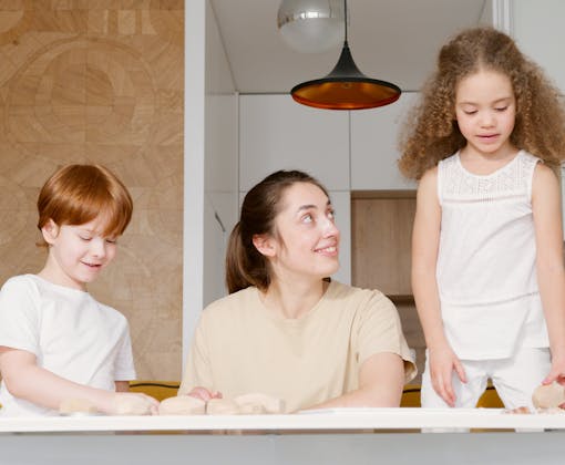 A cheerful family enjoying quality time at home, playing together indoors.