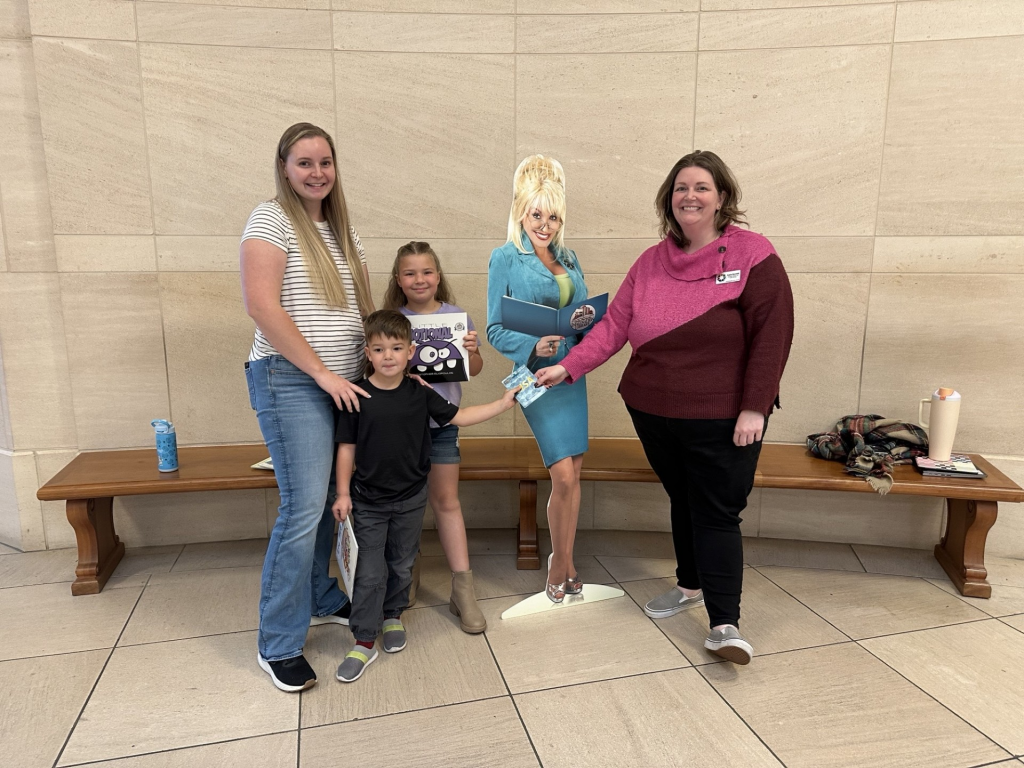 Lena and her children enjoying free books through the Chattahoochee Valley Imagination Library in Columbus GA
