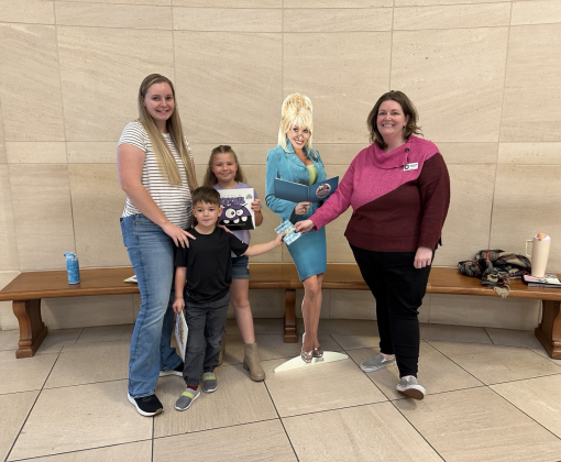 Lena and her children enjoying free books through the Chattahoochee Valley Imagination Library in Columbus GA