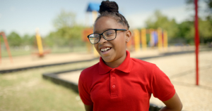 Journey, Ms. Kizzie’s daughter, smiling in a portrait