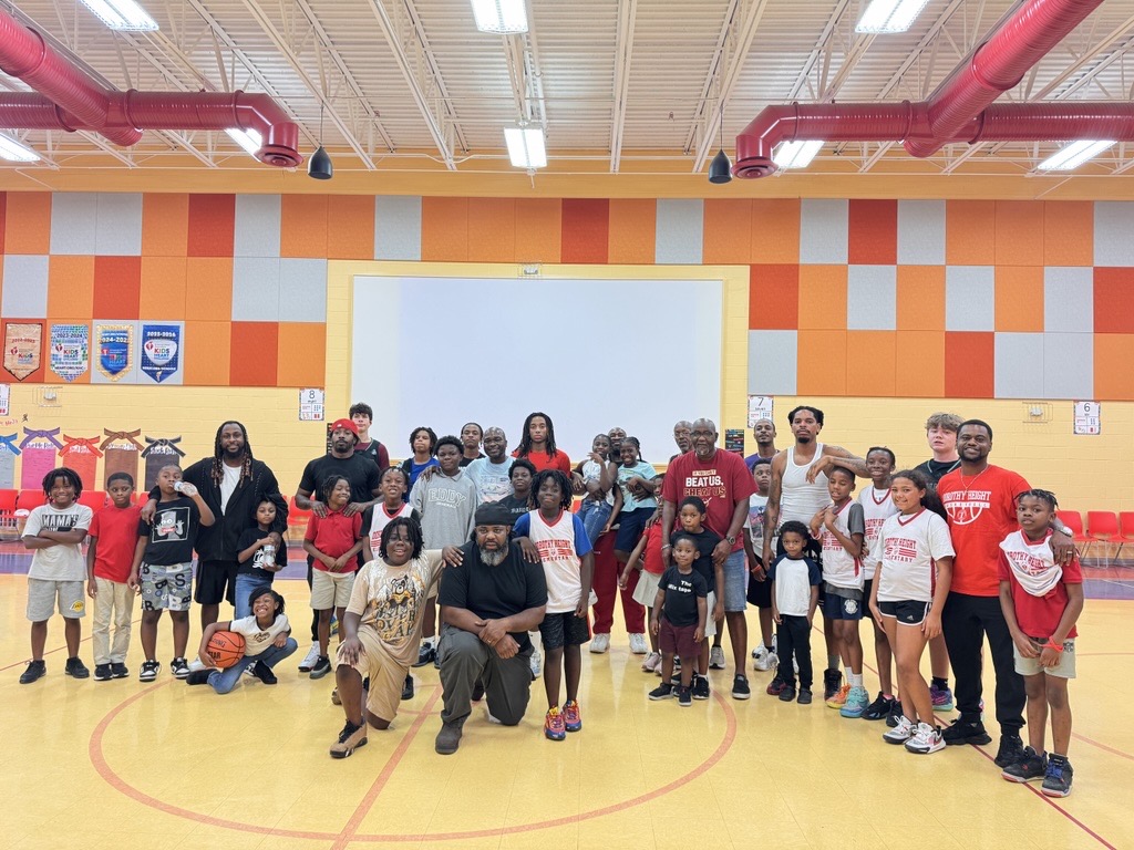 Dunk with Dads brings fathers and students together at Dorothy Height Elementary